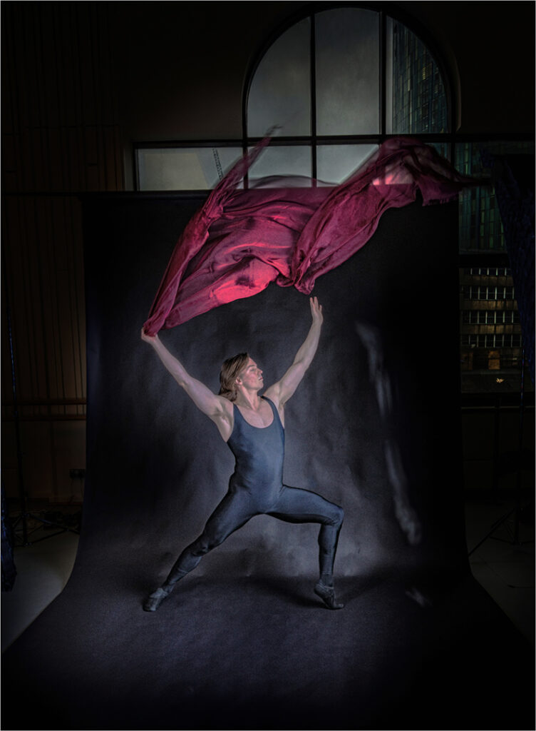 Kevin Faulkner - Hamish in his studio with red scarf